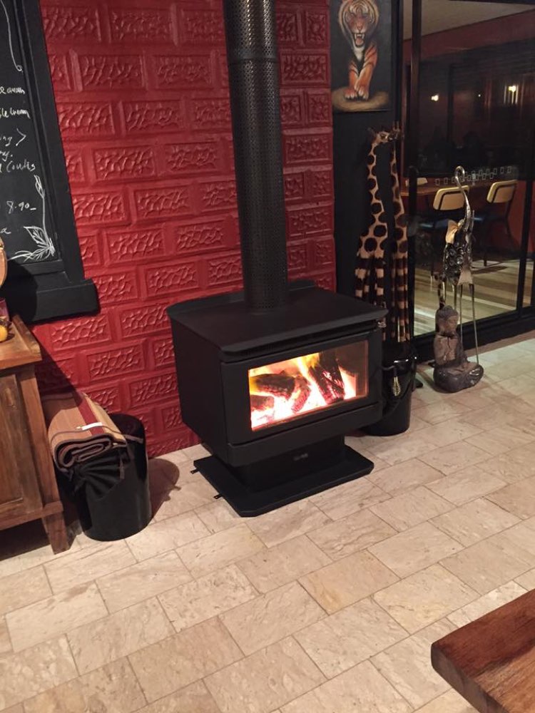 The wood fire going in winter